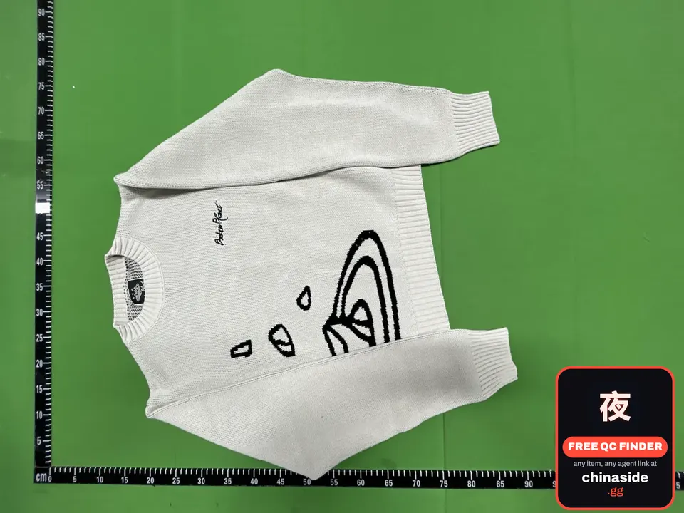 QC photo of the W Beige Sweater