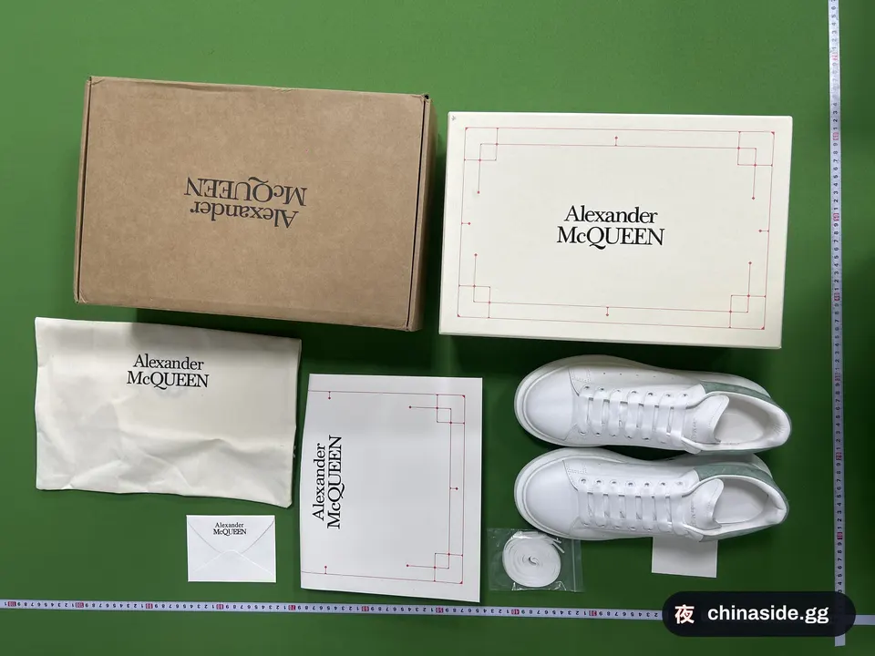 QC photo of the White Sneakers