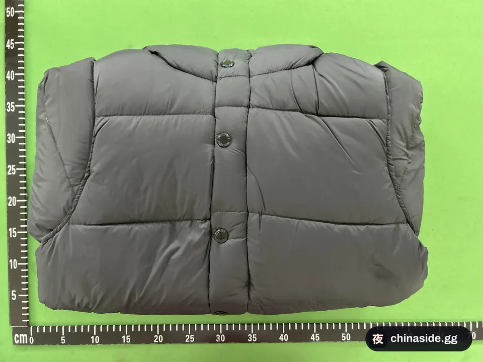 QC photo of the Bur* Down Jacket