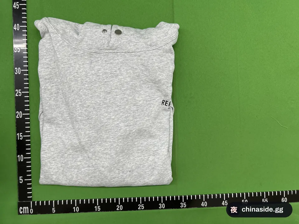 QC photo of the Loose Embroidery Hooded Sweater